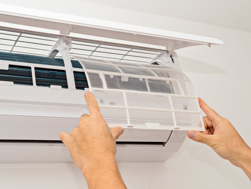 ductless air conditioner getting its filter changed