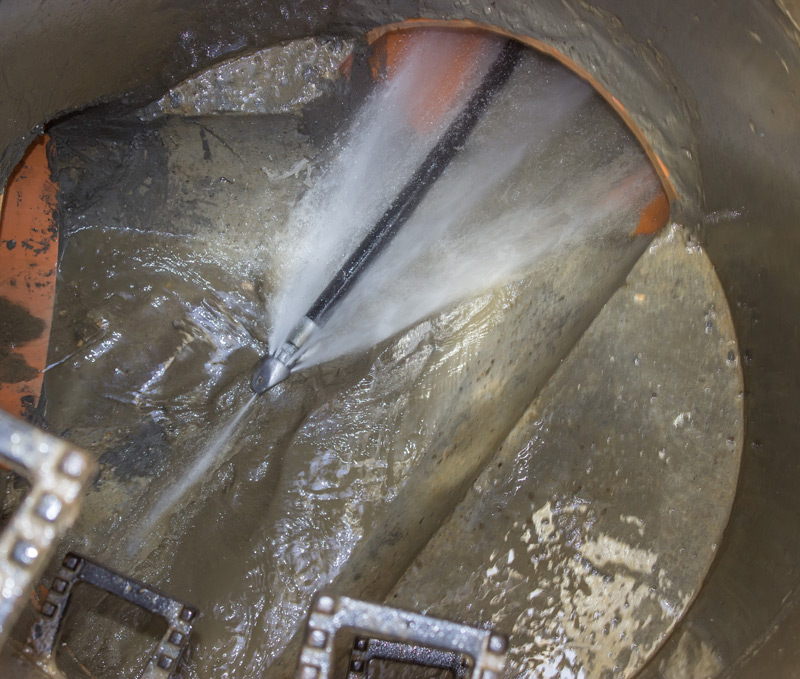 image of a pipe being hydro jetted.